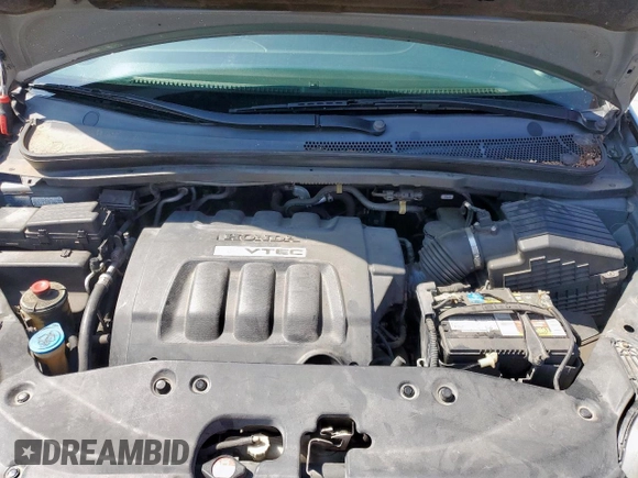 2007 Honda Odyssey EX with VIN 5FNRL38437B068697, listed as a Copart auction lot 60875505 with 211,688 mi miles and Salvage title. Bid and sale history available at DreamBid. Image 12.
