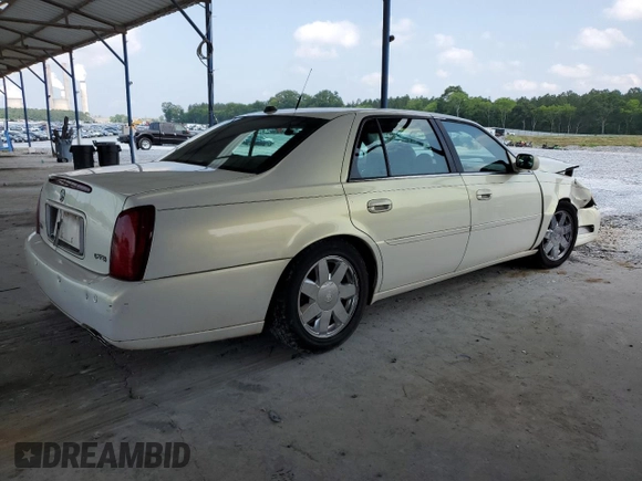 2004 Cadillac DeVille DTS z VIN 1G6KF57924U185324, wystawiony jako Copart lot #58222205 z przebiegiem 182 640 mil mil oraz Szkoda całkowita • Salvage title. Historia ofert i sprzedaży dostępna na DreamBid. Obrazek 3.