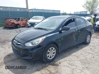 2012 Hyundai Accent GLS with VIN KMHCT4AE1CU260048, listed as a IAAI auction lot 42056125 with 168,530 mi miles. Bid and sale history available at carsss.com. Image 2.