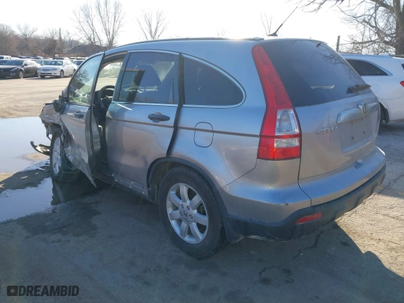 2007 Honda CR-V EX with VIN JHLRE48567C085583, listed as a IAAI auction lot 41509142 with 132,869 mi miles. Bid and sale history available at carsss.com. Image 3.