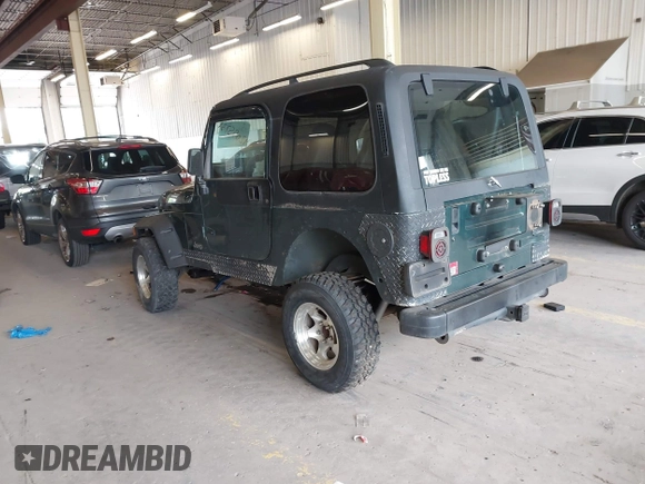 2000 Jeep Wrangler Sport with VIN 1J4FA49S8YP780104, listed as a IAAI auction lot 42095731 with Not provided miles and . Bid and sale history available at DreamBid. Image 3.