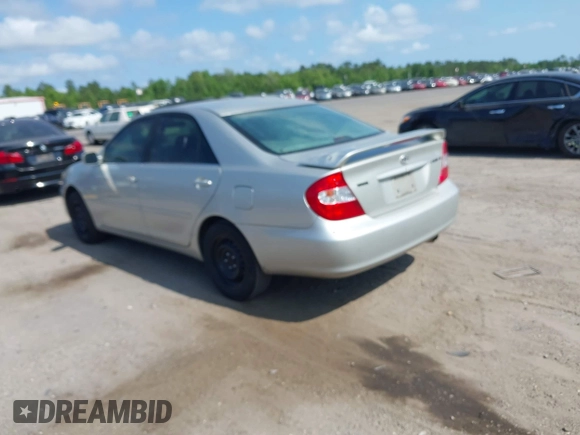2003 Toyota Camry LE with VIN 4T1BE32K63U752904, listed as a IAAI auction lot 42142677 with 112,895 mi miles and . Bid and sale history available at DreamBid. Image 3.
