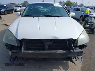 2005 Nissan Altima S z VIN 1N4AL11D25C301027, wystawiony jako IAAI lot #42349365 z przebiegiem 191 593 mil mil oraz . Historia ofert i sprzedaży dostępna na DreamBid. Obrazek 13.