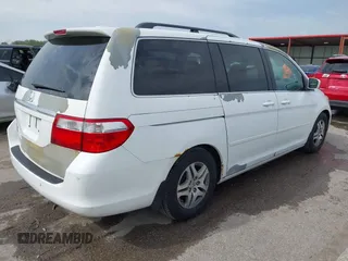 2007 Honda Odyssey Touring with VIN 5FNRL38887B081562, listed as a IAAI auction lot 42000435 with 238,287 mi miles and . Bid and sale history available at DreamBid. Image 4.