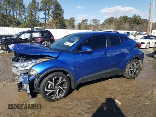 2022 Toyota C-HR XLE with VIN NMTKHMBX0NR141575, listed as a Copart auction lot 89013395 with 65,477 mi miles and Salvage Title. Bid and sale history available at carsss.com. Image 1.