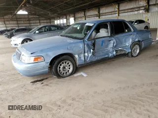 1999 Ford Crown Victoria LX z VIN 2FAFP74W2XX159035, wystawiony jako Copart lot #47583215 z przebiegiem 194 427 mil mil oraz Szkody całkowita. Historia ofert i sprzedaży dostępna na DreamBid. Obrazek 1.