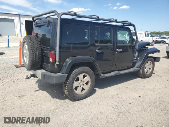 2012 Jeep Wrangler Unlimited Sahara with VIN 1C4HJWEG5CL205826, listed as a Copart auction lot 58222115 with 98,940 mi miles and Salvage title. Bid and sale history available at DreamBid. Image 3.