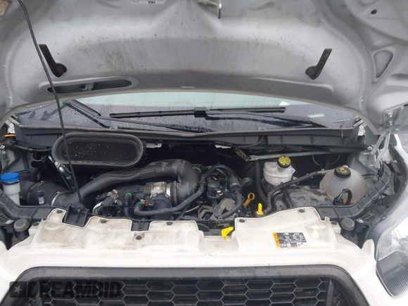 2021 Ford Transit Cargo with VIN 1FTBW1X84MKA98047, listed as a IAAI auction lot 42313747 with 65,600 mi miles and . Bid and sale history available at DreamBid. Image 10.