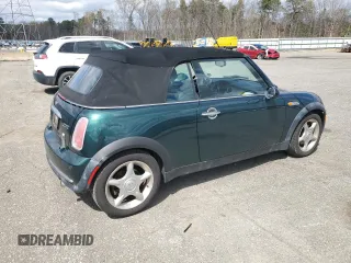 2005 MINI Convertible with VIN WMWRF33475TG10019, listed as a Copart auction lot 53307005 with 124,353 mi miles and Clean title. Bid and sale history available at DreamBid. Image 3.