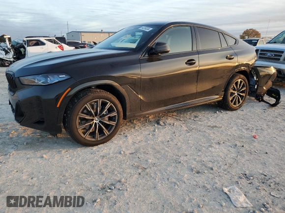 2025 BMW X6 xDrive40i with VIN 5UX33EX09S9Y26463, listed as a Copart auction lot 84269334 with 1,970 mi miles and Salvage Title. Bid and sale history available at carsss.com. Image 1.