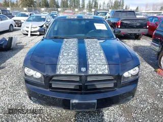 2009 Dodge Charger Police with VIN 2B3KA43T59H590578, listed as a IAAI auction lot 41602233 with 139,428 mi miles and . Bid and sale history available at carsss.com. Image 12.