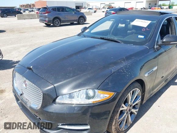 2015 Jaguar XJ R-Sport with VIN SAJWJ1CD6F8V83990, listed as a IAAI auction lot 41936162 with Not Provided miles and . Bid and sale history available at DreamBid. Image 6.