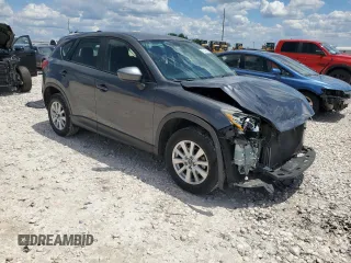 2014 Mazda CX-5 Sport z VIN JM3KE2BE8E0421316, wystawiony jako Copart lot #56548005 z przebiegiem 203 096 mil mil oraz Szkoda całkowita • Salvage title. Historia ofert i sprzedaży dostępna na DreamBid. Obrazek 4.