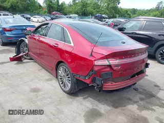 2014 Lincoln MKZ z VIN 3LN6L2G93ER802398, wystawiony jako IAAI lot #42205802 z przebiegiem 187 511 mil mil oraz . Historia ofert i sprzedaży dostępna na DreamBid. Obrazek 3.