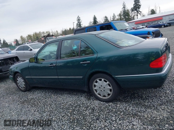 1998 Mercedes-Benz E-Class with VIN WDBJF65FXWA589630, listed as a IAAI auction lot 41990725 with 102,149 mi miles. Bid and sale history available at carsss.com. Image 14.