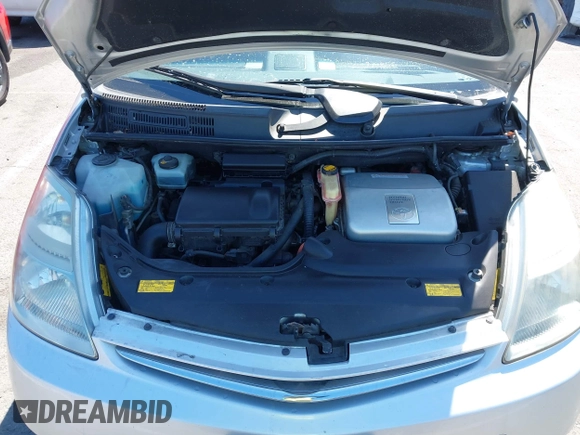 2007 Toyota Prius with VIN JTDKB20U877677686, listed as a IAAI auction lot 42234436 with 240,763 mi miles and . Bid and sale history available at DreamBid. Image 6.