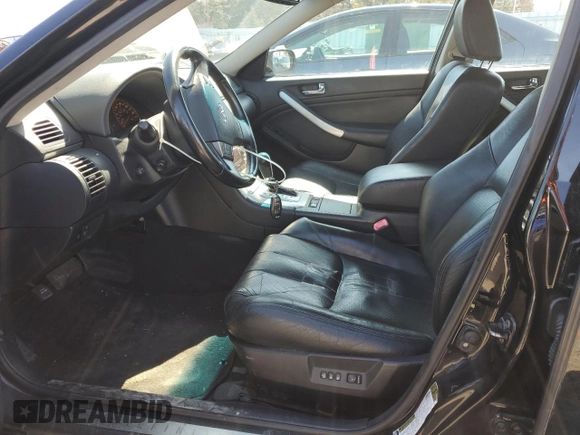 2006 Infiniti G35 z VIN JNKCV51FX6M617002, wystawiony jako Copart lot #51064345 z przebiegiem Nie podano mil oraz Szkody całkowita. Historia ofert i sprzedaży dostępna na DreamBid. Obrazek 7.