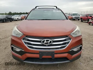 2017 Hyundai Santa Fe 2.4L z VIN 5XYZUDLB6HG411375, wystawiony jako Copart lot #50551165 z przebiegiem 35 597 mil mil oraz Czysty tytuł • Clean title. Historia ofert i sprzedaży dostępna na DreamBid. Obrazek 5.