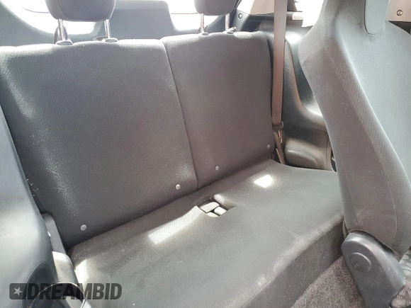 2012 Scion iQ z VIN JTNJJXB06CJ009187, wystawiony jako Copart lot #56563665 z przebiegiem 105 014 mil mil oraz Szkoda całkowita • Salvage title. Historia ofert i sprzedaży dostępna na DreamBid. Obrazek 10.