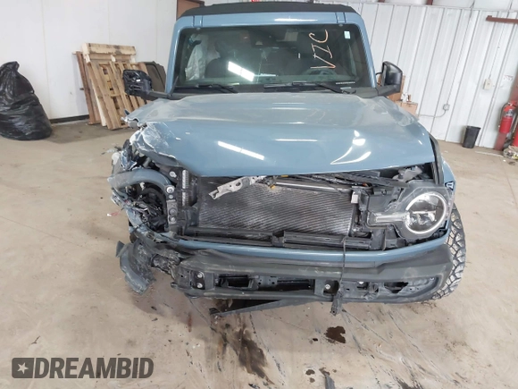 2023 Ford Bronco with VIN 1FMDE5BH2PLB16114, listed as a IAAI auction lot 41392107 with 37,400 mi miles and . Bid and sale history available at DreamBid. Image 12.