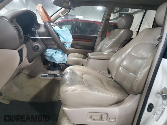 2000 Lexus LX 470 z VIN JT6HT00W9Y0109333, wystawiony jako Copart lot #47589965 z przebiegiem 261 766 mil mil oraz Szkody całkowita. Historia ofert i sprzedaży dostępna na DreamBid. Obrazek 7.