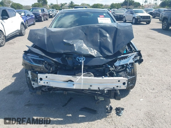 2025 Toyota Camry LE with VIN 4T1DAACK5SU076886, listed as a IAAI auction lot 41629641 with 9,919 mi miles and . Bid and sale history available at DreamBid. Image 13.