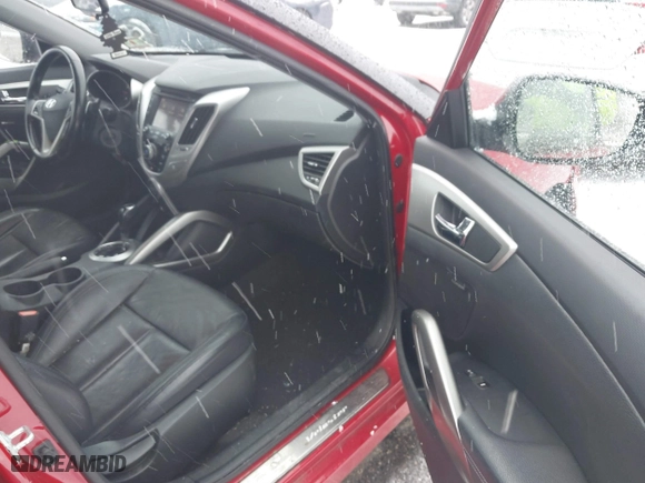 2014 Hyundai Veloster with VIN KMHTC6AD8EU214612, listed as a IAAI auction lot 41258820 with 61,984 mi miles. Bid and sale history available at carsss.com. Image 5.