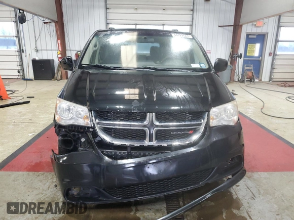2014 Dodge Grand Caravan SXT with VIN 2C4RDGCG4ER388702, listed as a Copart auction lot 44722665 with 206,299 mi miles and Salvage Title. Bid and sale history available at DreamBid. Image 5.
