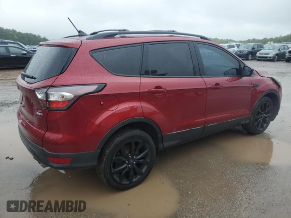 2018 Ford Escape SE z VIN 1FMCU9GD4JUA49819, wystawiony jako Copart lot #73023734 z przebiegiem 96 228 mil mil oraz Szkody całkowita. Historia ofert i sprzedaży dostępna na DreamBid. Obrazek 3.