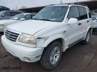 2001 Suzuki Grand Vitara JLX with VIN JS3TD62V114157738, listed as a IAAI auction lot 41721813 with 134,661 mi miles. Bid and sale history available at carsss.com. Image 2.