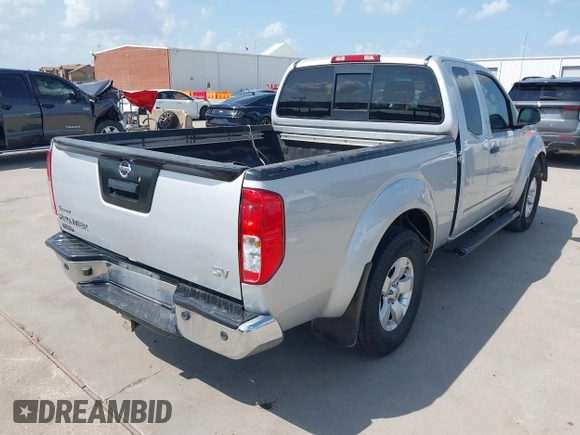 2013 Nissan Frontier SV with VIN 1N6AD0CUXDN763835, listed as a IAAI auction lot 42519926 with 208,577 mi miles and . Bid and sale history available at DreamBid. Image 4.