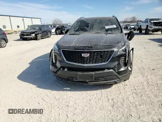 2023 Cadillac XT4 FWD Sport with VIN 1GYFZER47PF107311, listed as a Copart auction lot 87583565 with 26,585 mi miles and Salvage title. Bid and sale history available at DreamBid. Image 12.