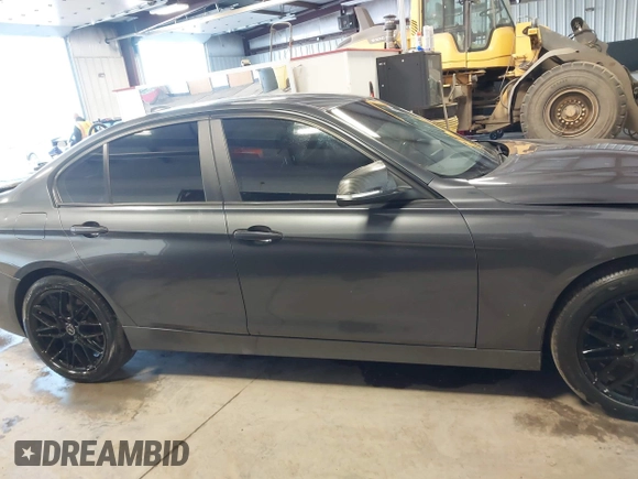 2015 BMW 3 Series 328i xDrive with VIN WBA3B5G53FNS17413, listed as a IAAI auction lot 41643479 with 99,065 mi miles. Bid and sale history available at carsss.com. Image 13.