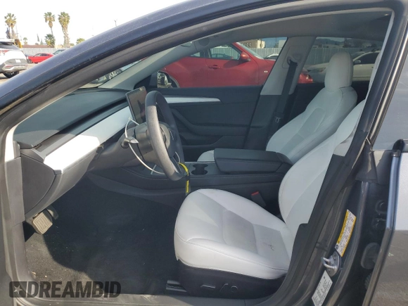 2022 Tesla Model 3 z VIN 5YJ3E1EA1NF337727, wystawiony jako Copart lot #51175655 z przebiegiem 40 551 mil mil oraz Szkoda całkowita • Salvage title. Historia ofert i sprzedaży dostępna na DreamBid. Obrazek 7.