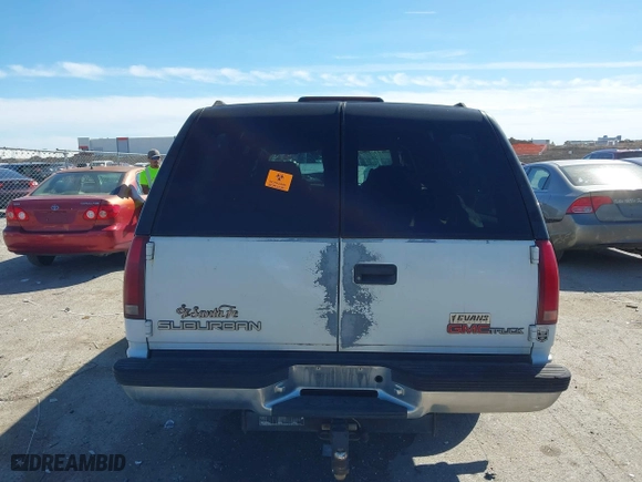 1996 GMC Suburban with VIN 1GDEC16R8TJ738647, listed as a IAAI auction lot 41688543 with 216,078 mi miles. Bid and sale history available at carsss.com. Image 17.