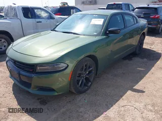 2021 Dodge Charger SXT with VIN 2C3CDXBG7MH681655, listed as a IAAI auction lot 42181067 with 66,036 mi miles and . Bid and sale history available at DreamBid. Image 2.