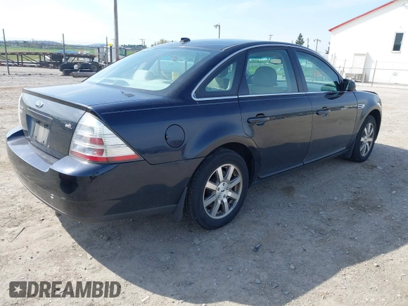 2008 Ford Taurus SEL with VIN 1FAHP24W48G131630, listed as a IAAI auction lot 42042813 with 86,855 mi miles. Bid and sale history available at carsss.com. Image 4.