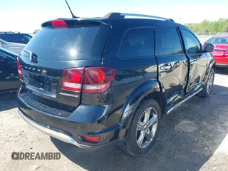 2017 Dodge Journey Crossroad Plus z VIN 3C4PDCGB0HT552964, wystawiony jako IAAI lot #41991261 z przebiegiem 142 352 mil mil oraz . Historia ofert i sprzedaży dostępna na DreamBid. Obrazek 4.