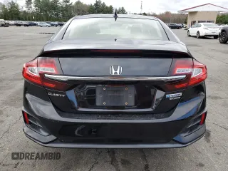2018 Honda Clarity Touring z VIN JHMZC5F31JC007583, wystawiony jako Copart lot #53308235 z przebiegiem 117 234 mil mil oraz Szkoda całkowita • Salvage title. Historia ofert i sprzedaży dostępna na DreamBid. Obrazek 6.