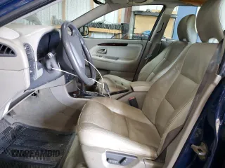 2003 Volvo V40 z VIN YV1VW27533F988646, wystawiony jako Copart lot #76371774 z przebiegiem 154 126 mil mil oraz Tytuł czysty. Historia ofert i sprzedaży dostępna na DreamBid. Obrazek 7.