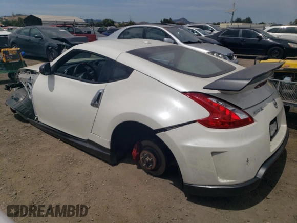 2014 Nissan 370Z with VIN JN1AZ4EH2EM631397, listed as a Copart auction lot 65758844 with 0 mi miles and Salvage Title. Bid and sale history available at carsss.com. Image 2.