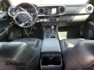 2018 Toyota Tacoma SR with VIN 3TMGZ5AN6JM163097, listed as a Copart auction lot 52633665 with 39,910 mi miles and Salvage Title. Bid and sale history available at DreamBid. Image 8.