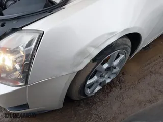 2009 Cadillac CTS AWD w/1SB with VIN 1G6DS57V890123958, listed as a IAAI auction lot 41056440 with 160,288 mi miles. Bid and sale history available at carsss.com. Image 6.