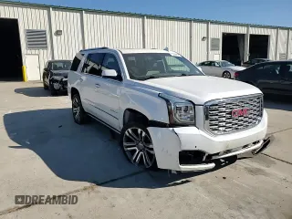2019 GMC Yukon Denali with VIN 1GKS2CKJ1KR310963, listed as a Copart auction lot 75862254 with 102,602 mi miles and Salvage Title. Bid and sale history available at carsss.com. Image 12.