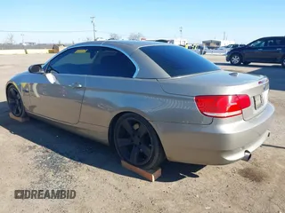 2007 BMW 3 Series 335i with VIN WBAWL73587PX49841, listed as a IAAI auction lot 41321892 with 173,556 mi miles. Bid and sale history available at carsss.com. Image 3.