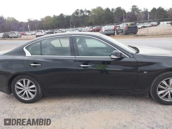 2015 Infiniti Q50 Premium z VIN JN1BV7ARXFM410177, wystawiony jako IAAI lot #41936999 z przebiegiem 129 123 mil mil oraz . Historia ofert i sprzedaży dostępna na DreamBid. Obrazek 13.