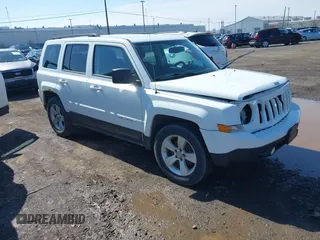 2014 Jeep Patriot Latitude with VIN 1C4NJPFA8ED550221, listed as a IAAI auction lot 41919419 with 185,386 mi miles and . Bid and sale history available at carsss.com. Image 1.