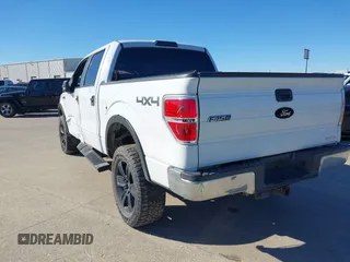 2014 Ford F-150 XL with VIN 1FTFW1EF0EFC74637, listed as a IAAI auction lot 41459594 with 164,970 mi miles. Bid and sale history available at carsss.com. Image 3.