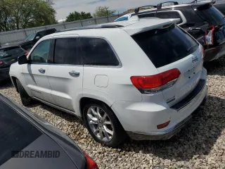2015 Jeep Grand Cherokee Summit with VIN 1C4RJFJM5FC738473, listed as a Copart auction lot 61049565 with 176,053 mi miles and Clean title. Bid and sale history available at DreamBid. Image 2.