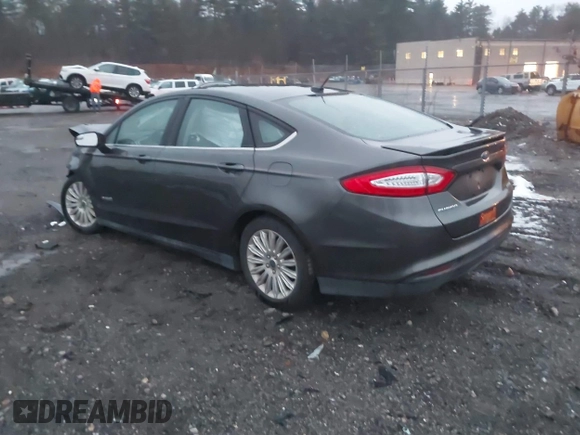 2015 Ford Fusion S Hybrid with VIN 3FA6P0UU2FR102241, listed as a IAAI auction lot 41003479 with 88,020 mi miles. Bid and sale history available at carsss.com. Image 3.